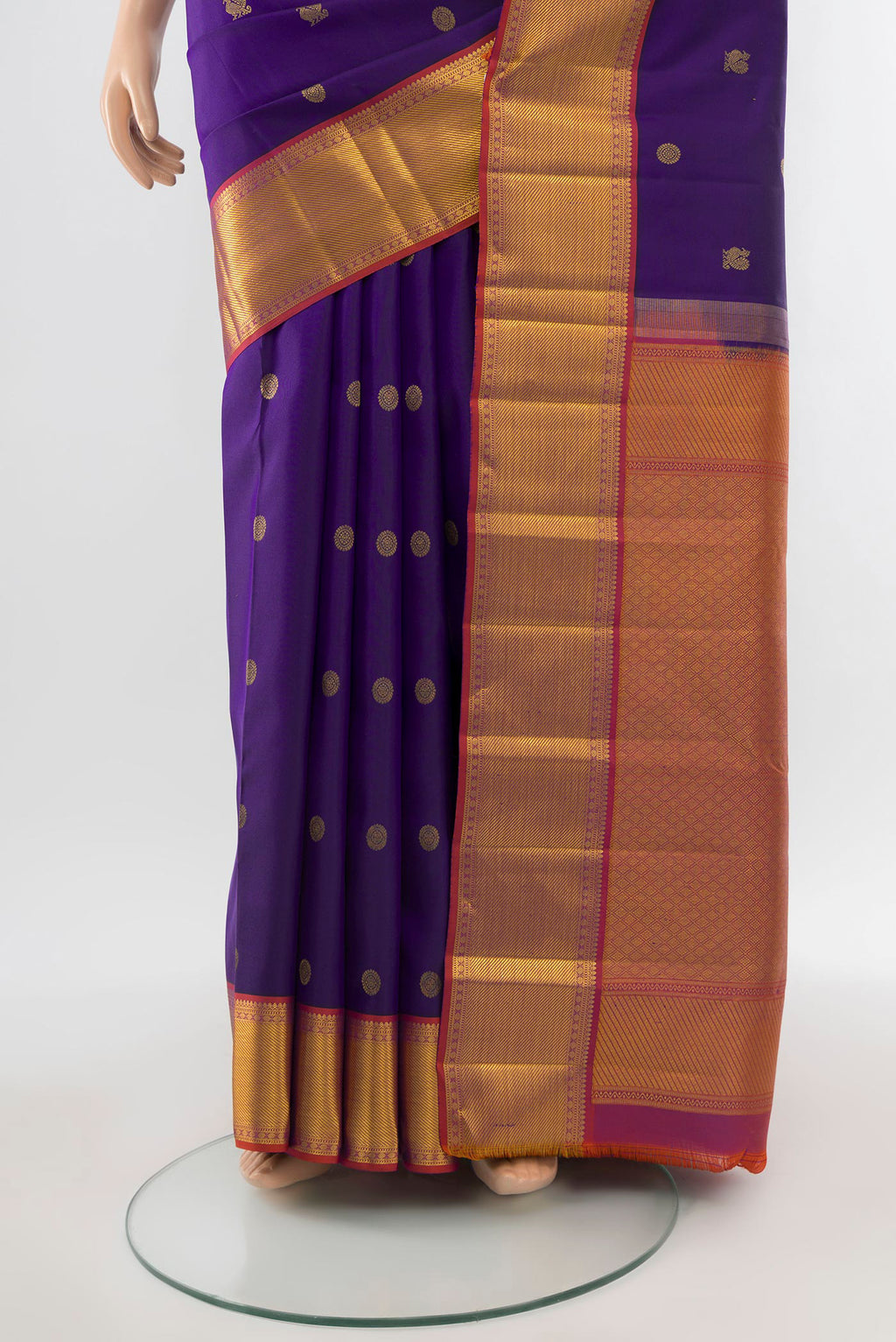 Pleats and pallu of Pure Silk Pure Zari Dark Blue Kanchipuram Saree with Zari Butta on the body and Silk Border. 