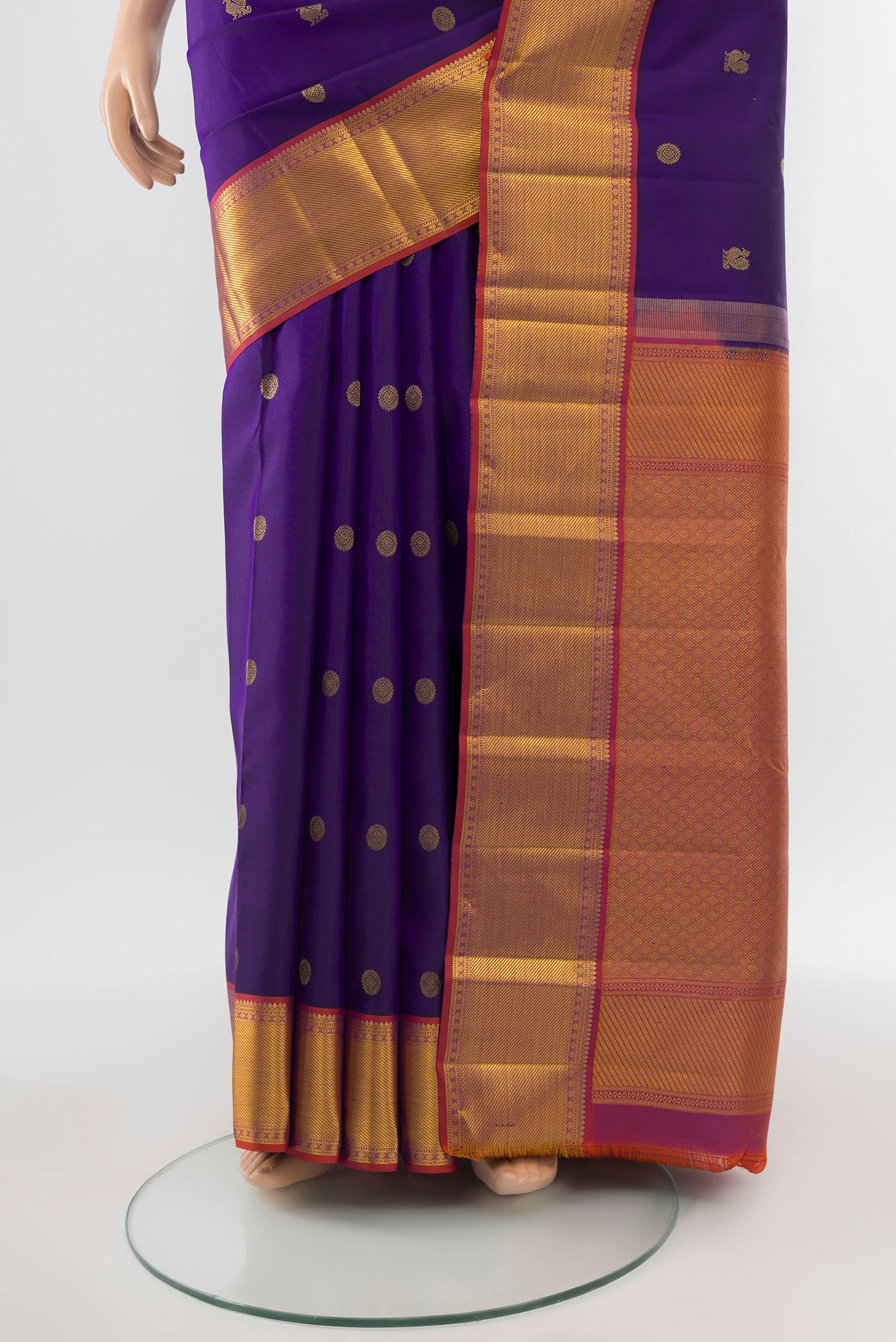 Pleats and pallu of Pure Silk Pure Zari Dark Blue Kanchipuram Saree with Zari Butta on the body and Silk Border. 