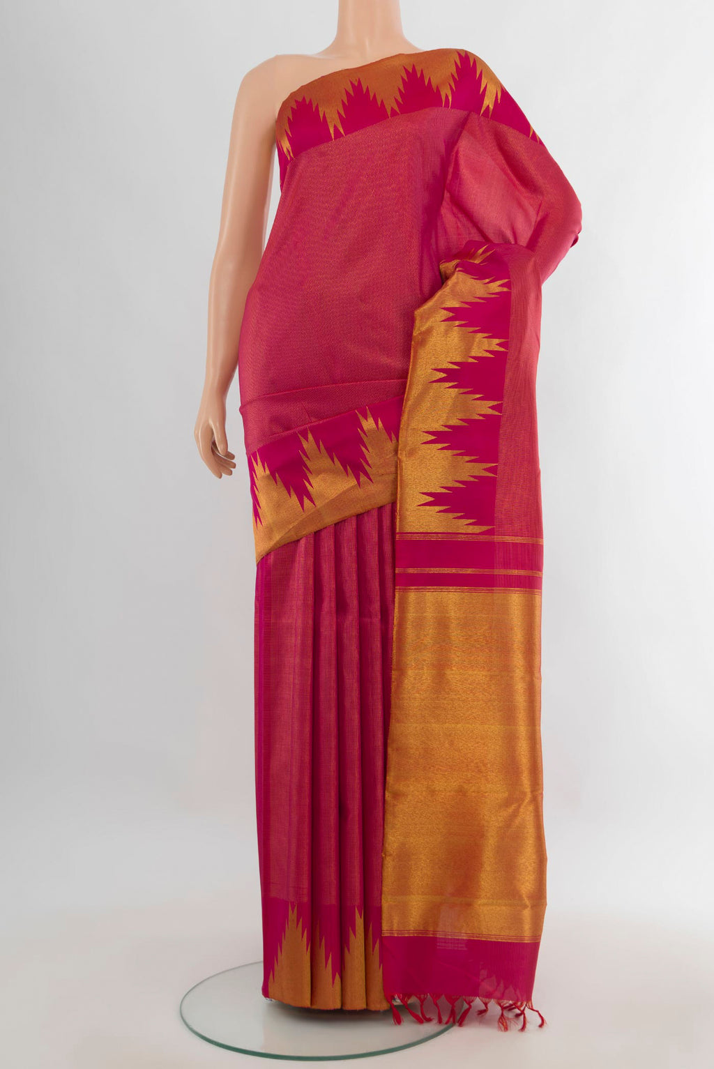 Pure Silk Pink Kanchipuram Saree with Zari Brocade on the body and Temple Border.  displayed on a mannequin