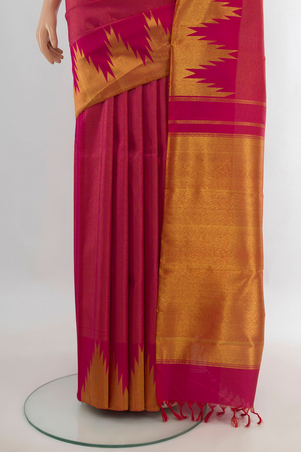 Pleats and pallu of Pure Silk Pink Kanchipuram Saree with Zari Brocade on the body and Temple Border. 