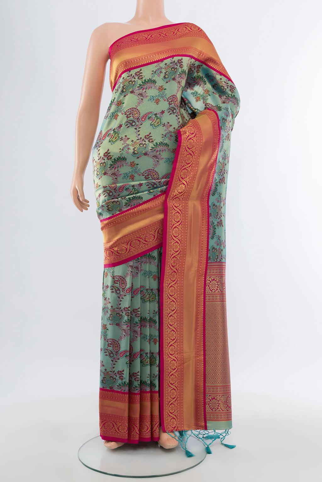 Light Blue Art Silk Saree with Zari Butta on the body and Zari Border.  displayed on a mannequin