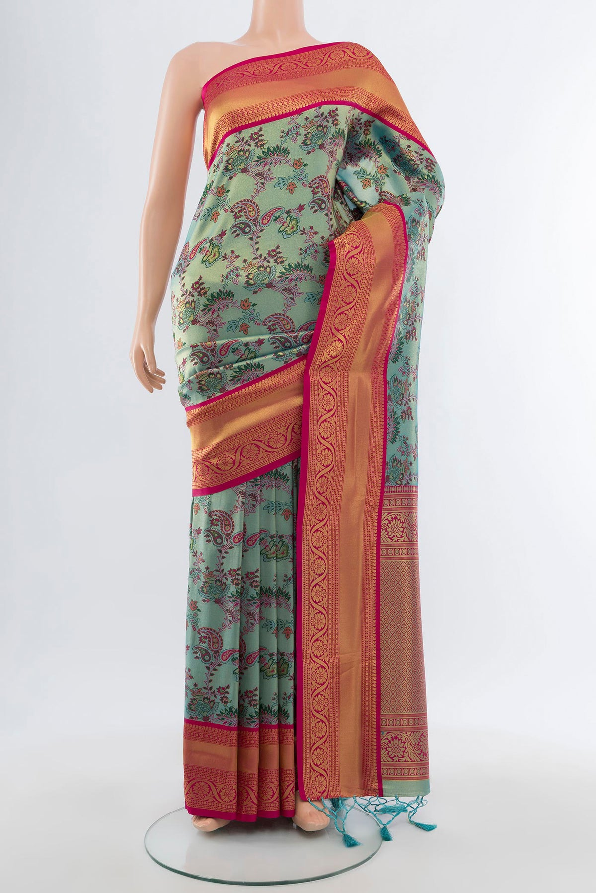 Light Blue Art Silk Saree with Zari Butta on the body and Zari Border.  displayed on a mannequin