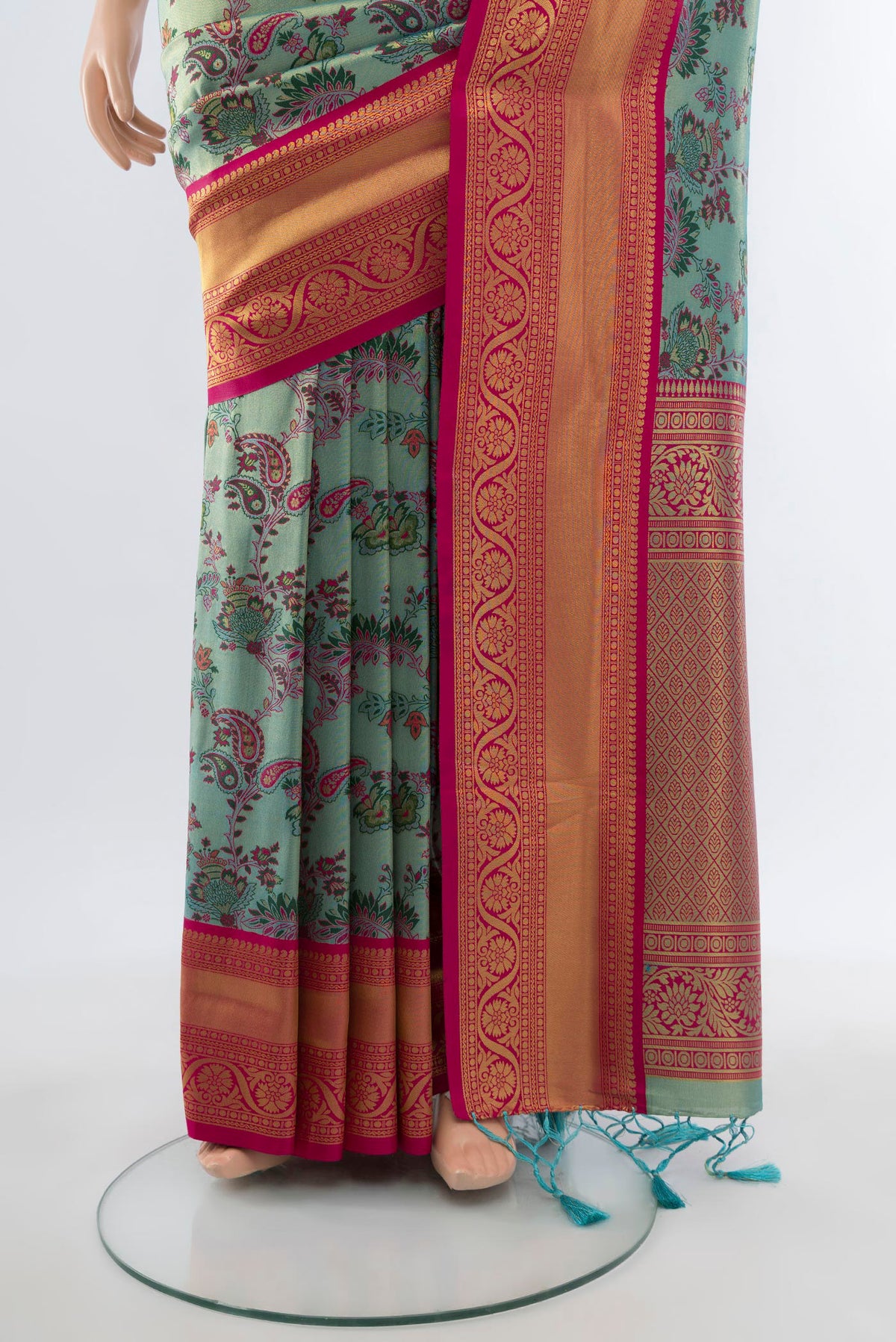 Pleats and pallu of Light Blue Art Silk Saree with Zari Butta on the body and Zari Border. 