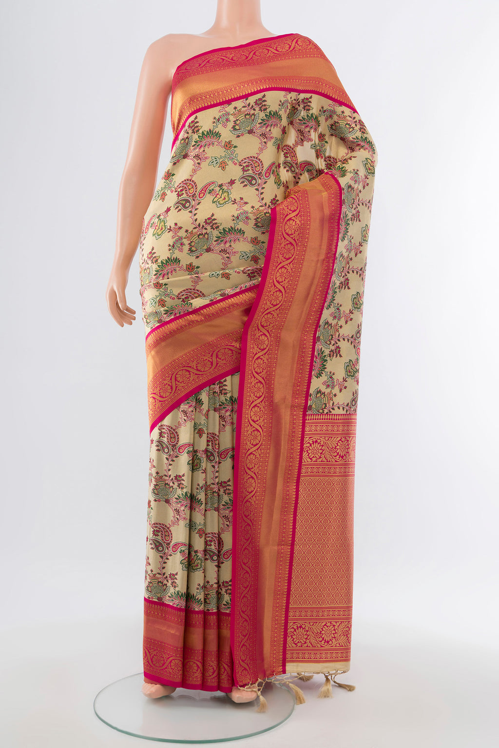 Multi Color Art Silk Saree with Zari Butta on the body and Silk Border.  displayed on a mannequin