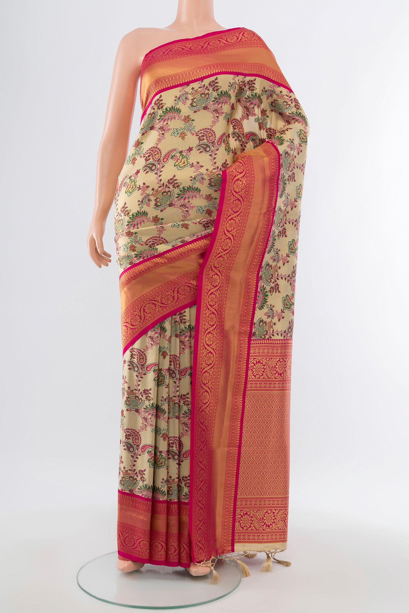 Multi Color Art Silk Saree with Zari Butta on the body and Silk Border.  displayed on a mannequin