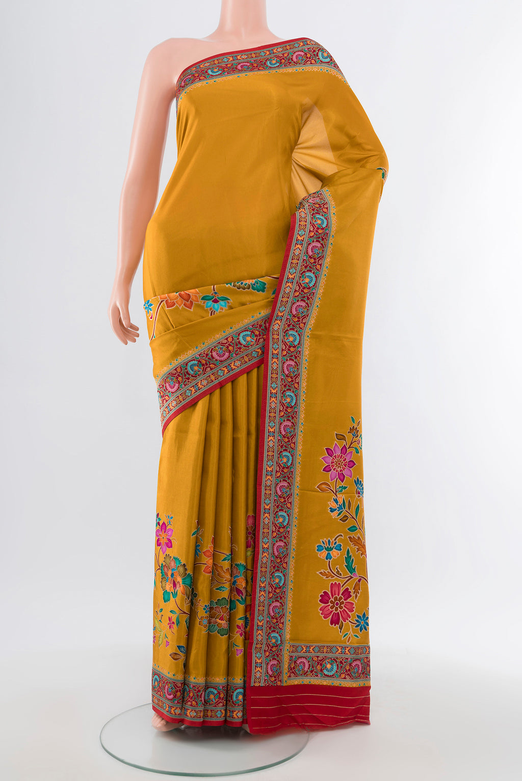 Mustard Art Silk Saree with Zari Butta on the body and Silk Border.  displayed on a mannequin