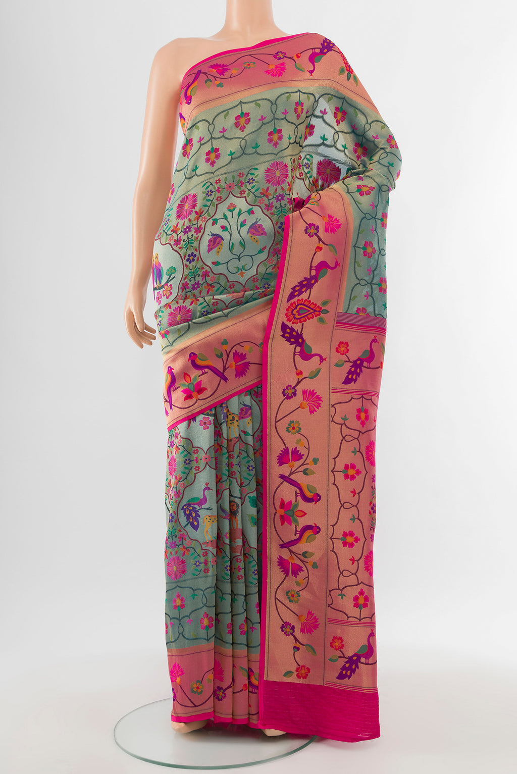 Multi Color Banarasi Silk Saree with Floral Print on the body and Silk Border.  displayed on a mannequin