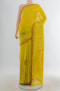 Pure Silk Lemon Yellow Uppada Saree with Zari Butta on the body and Zari Border.  displayed on a mannequin
