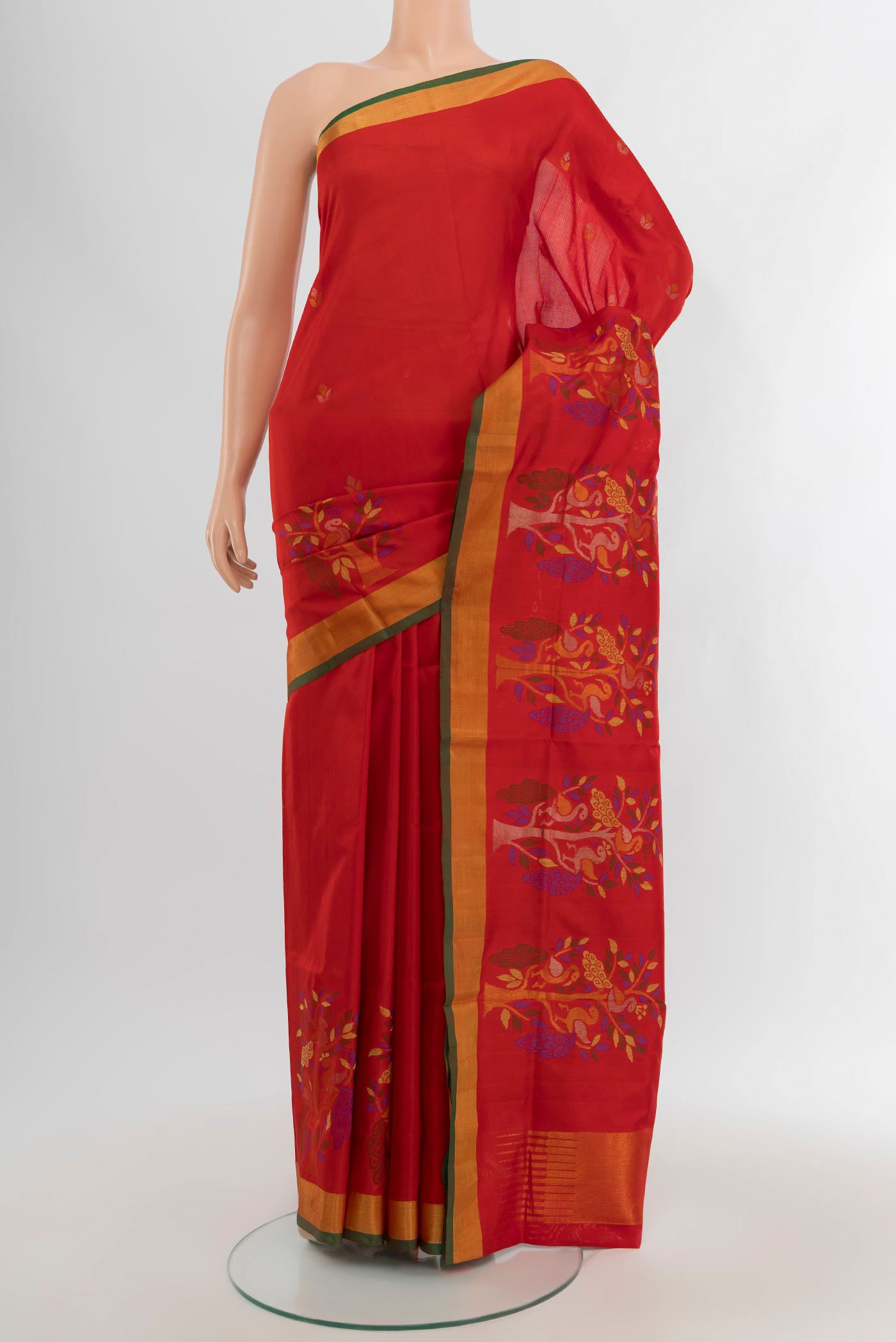 Red Uppada Silk Saree with Zari Butta on the body and Zari Border.  displayed on a mannequin