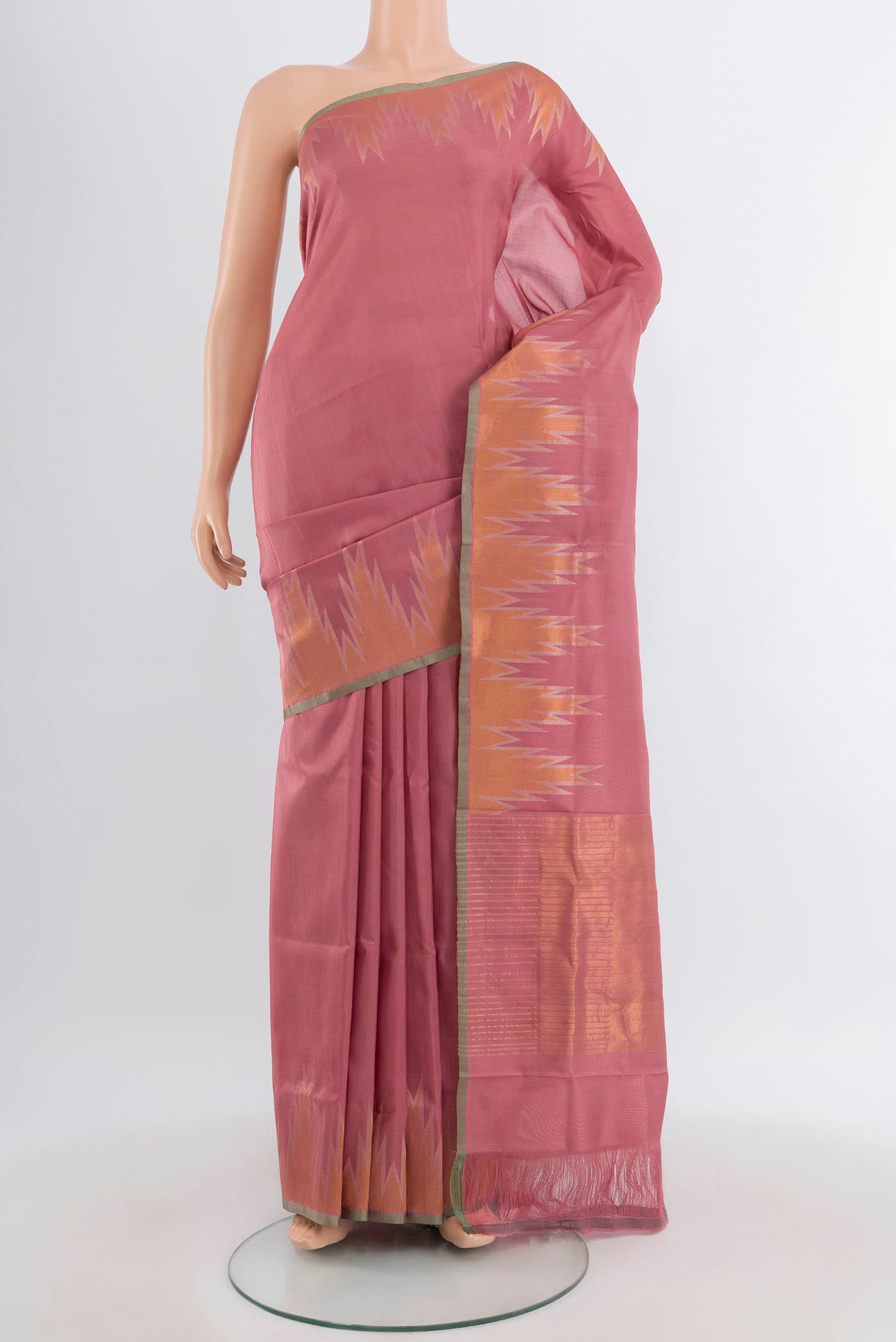 Rose Gold Uppada Silk Saree with Plain Body and Temple Border.  displayed on a mannequin