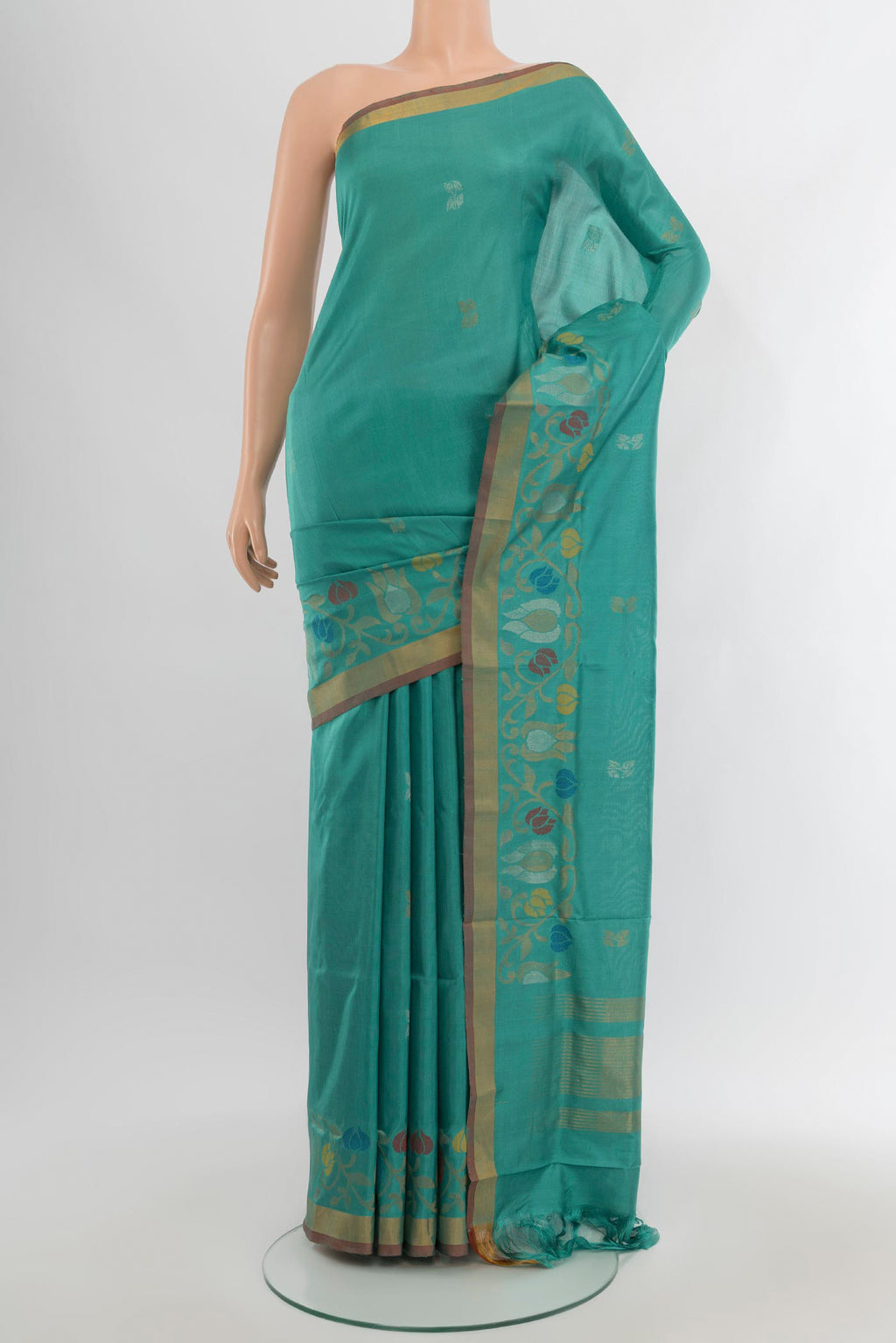 Light Blue Uppada Silk Saree with Zari Butta on the body and Zari Border.  displayed on a mannequin