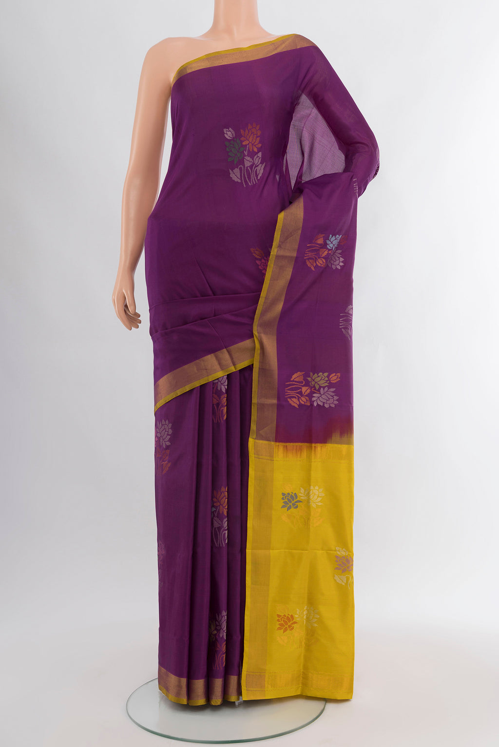 Purple Uppada Silk Saree with Zari Butta on the body and Zari Border.  displayed on a mannequin