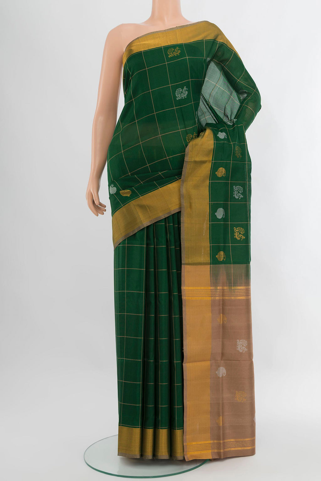 Bottle Green Uppada Silk Saree with Checked design on the body and Zari Border.  displayed on a mannequin
