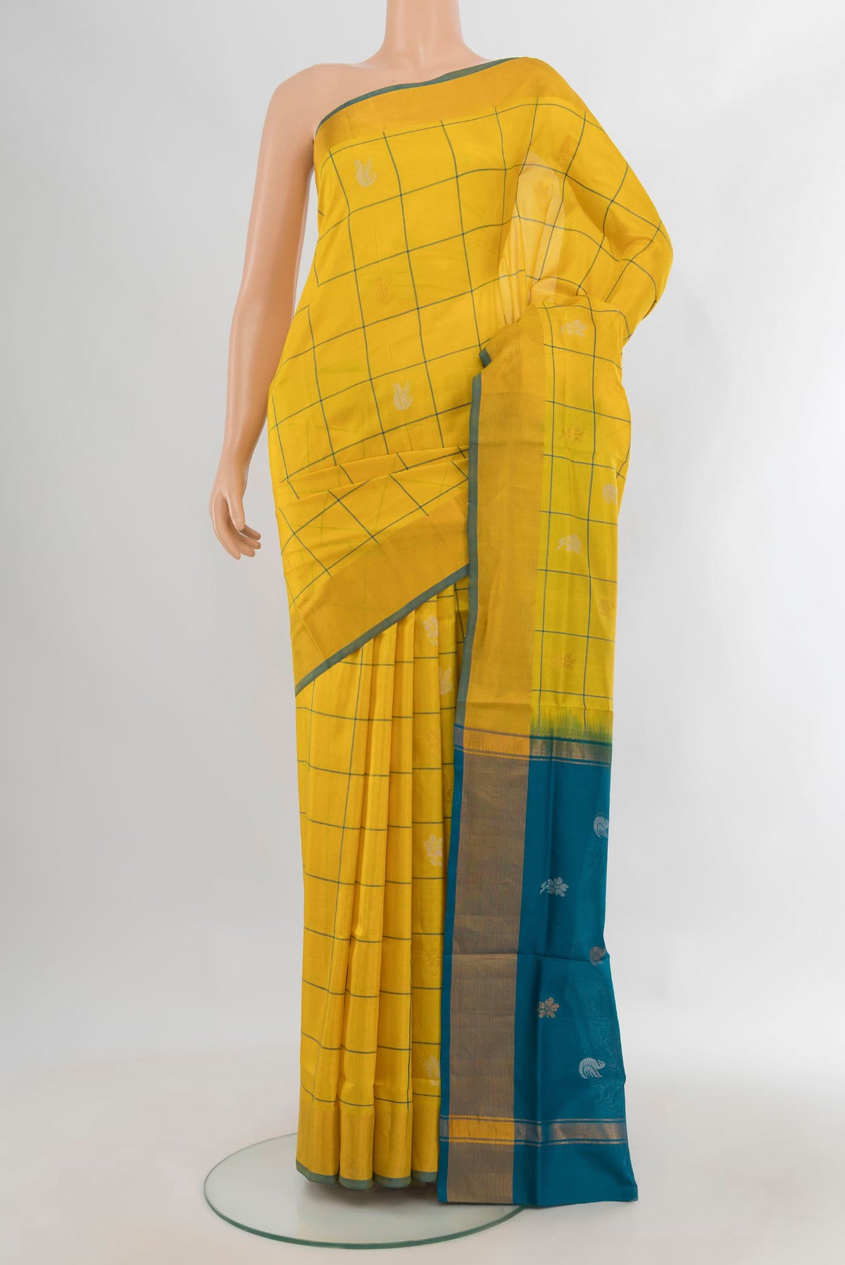 Pure Silk Yellow Uppada Saree with Checked design on the body and Zari Border.  displayed on a mannequin
