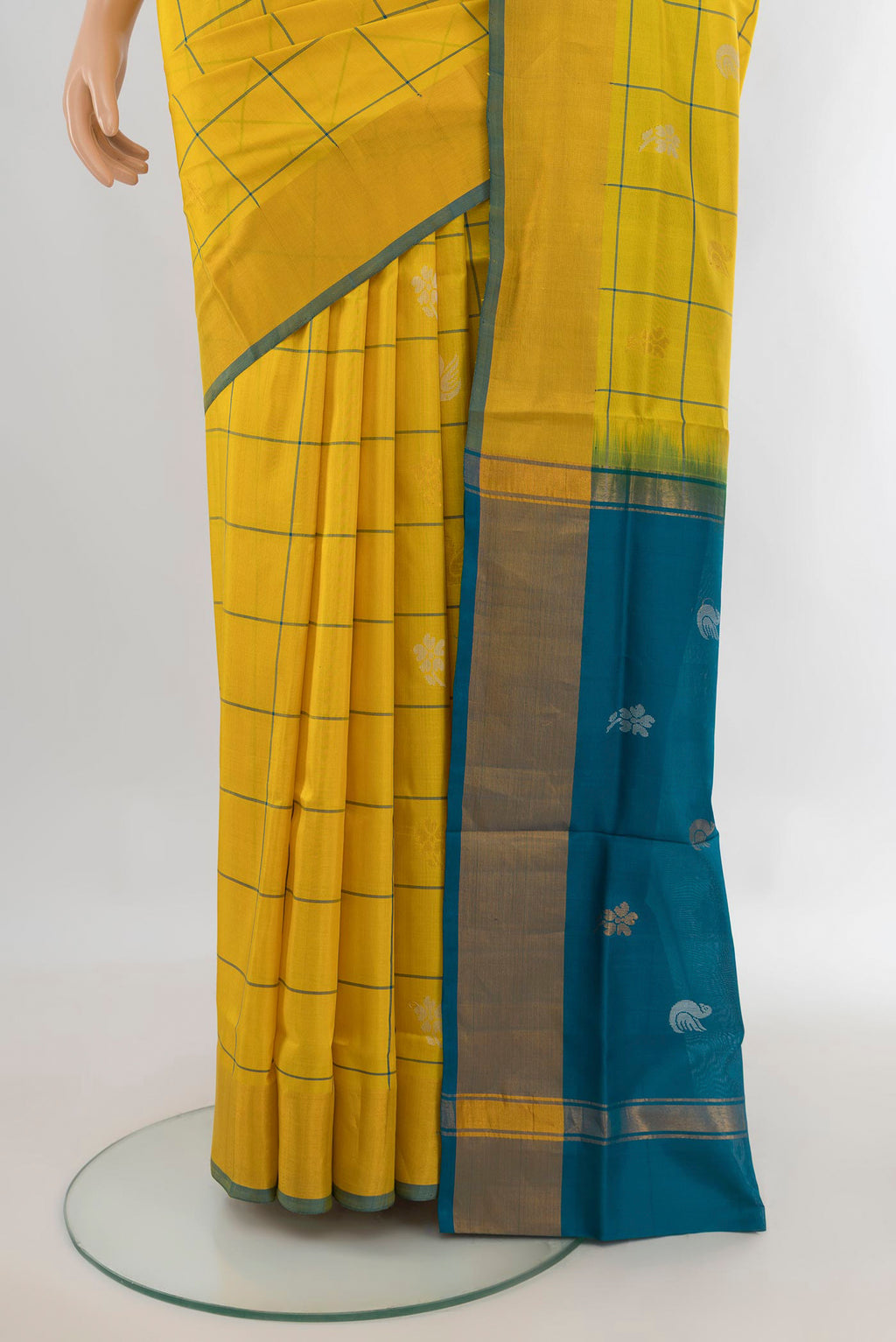 Pleats and pallu of Pure Silk Yellow Uppada Saree with Checked design on the body and Zari Border. 