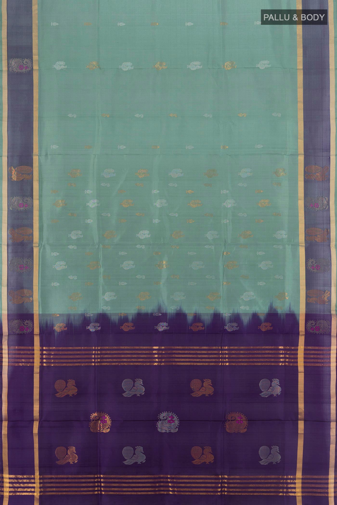 Flat view of Grey Uppada Silk Saree with Zari Butta on the body and Plain Border. 