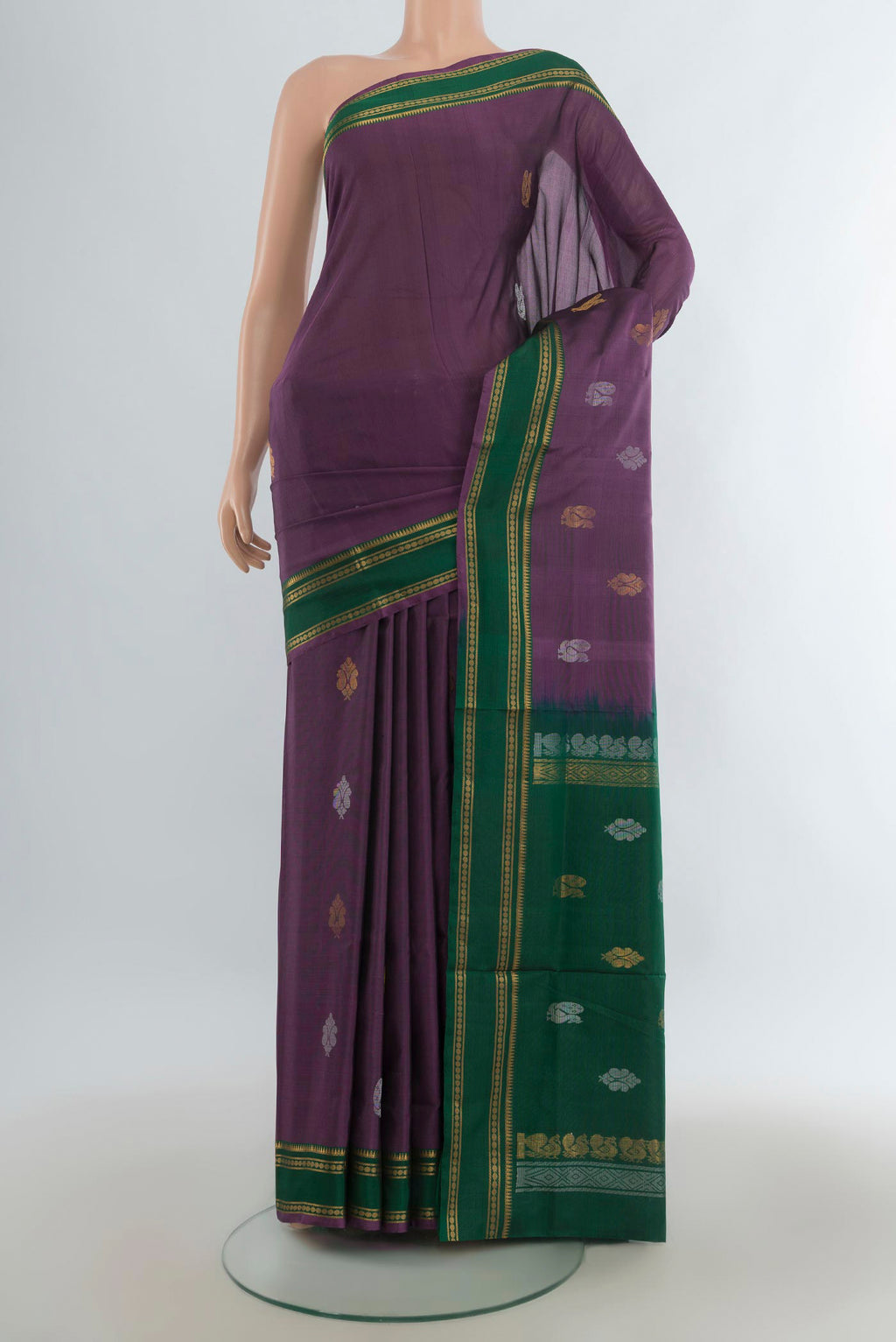 Pure Silk Mauve Uppada Saree with Zari Butta on the body and Zari Border.  displayed on a mannequin