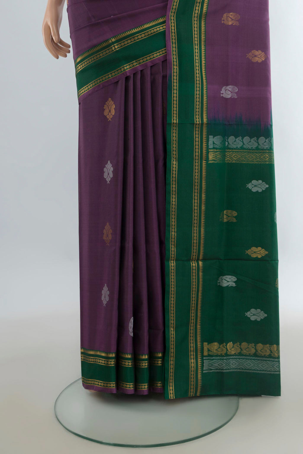Pleats and pallu of Pure Silk Mauve Uppada Saree with Zari Butta on the body and Zari Border. 