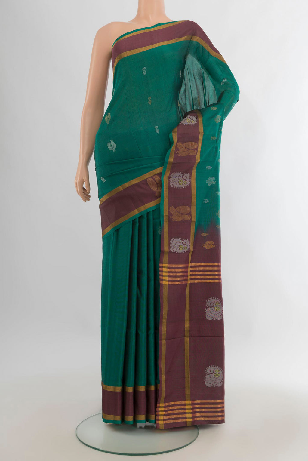 Pure Silk Green Uppada Saree with Zari Butta on the body and Zari Border.  displayed on a mannequin