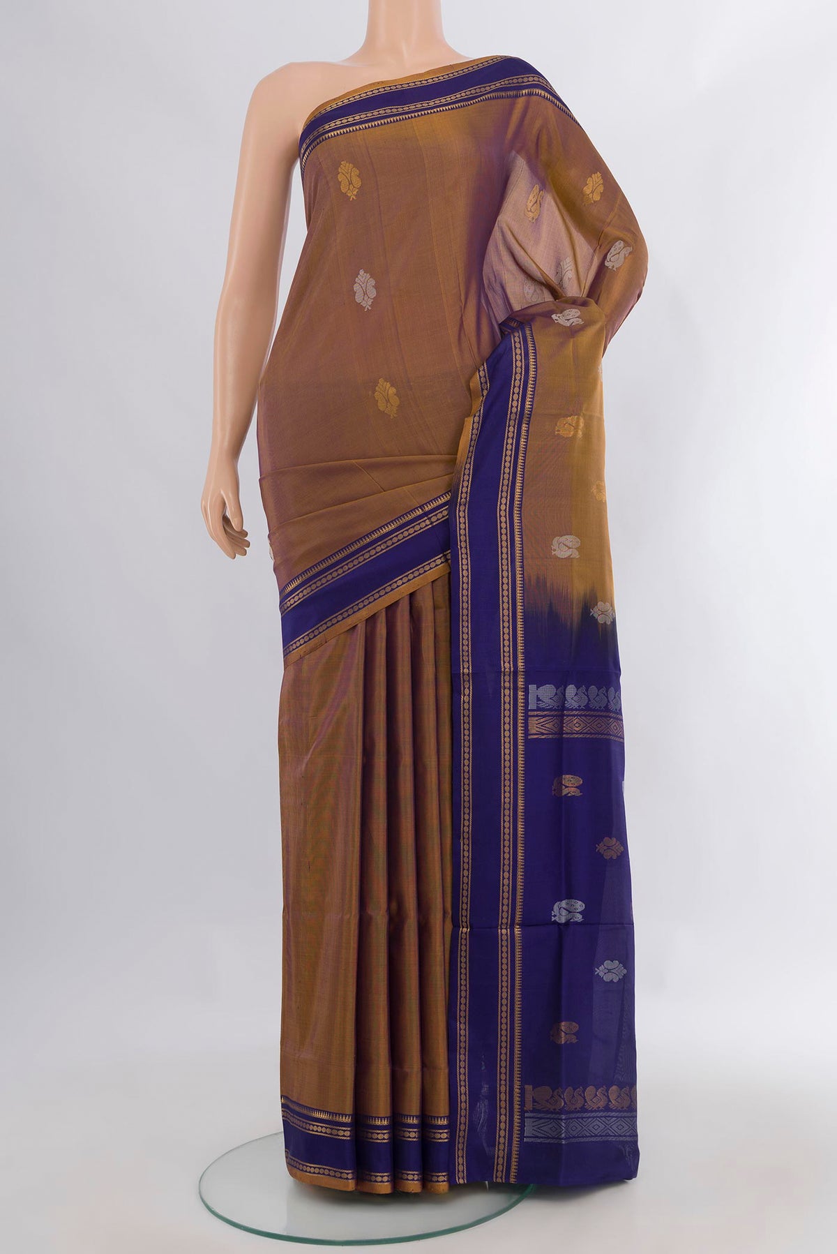Pure Silk Brown Uppada Saree with Zari Butta on the body and Plain Border.  displayed on a mannequin