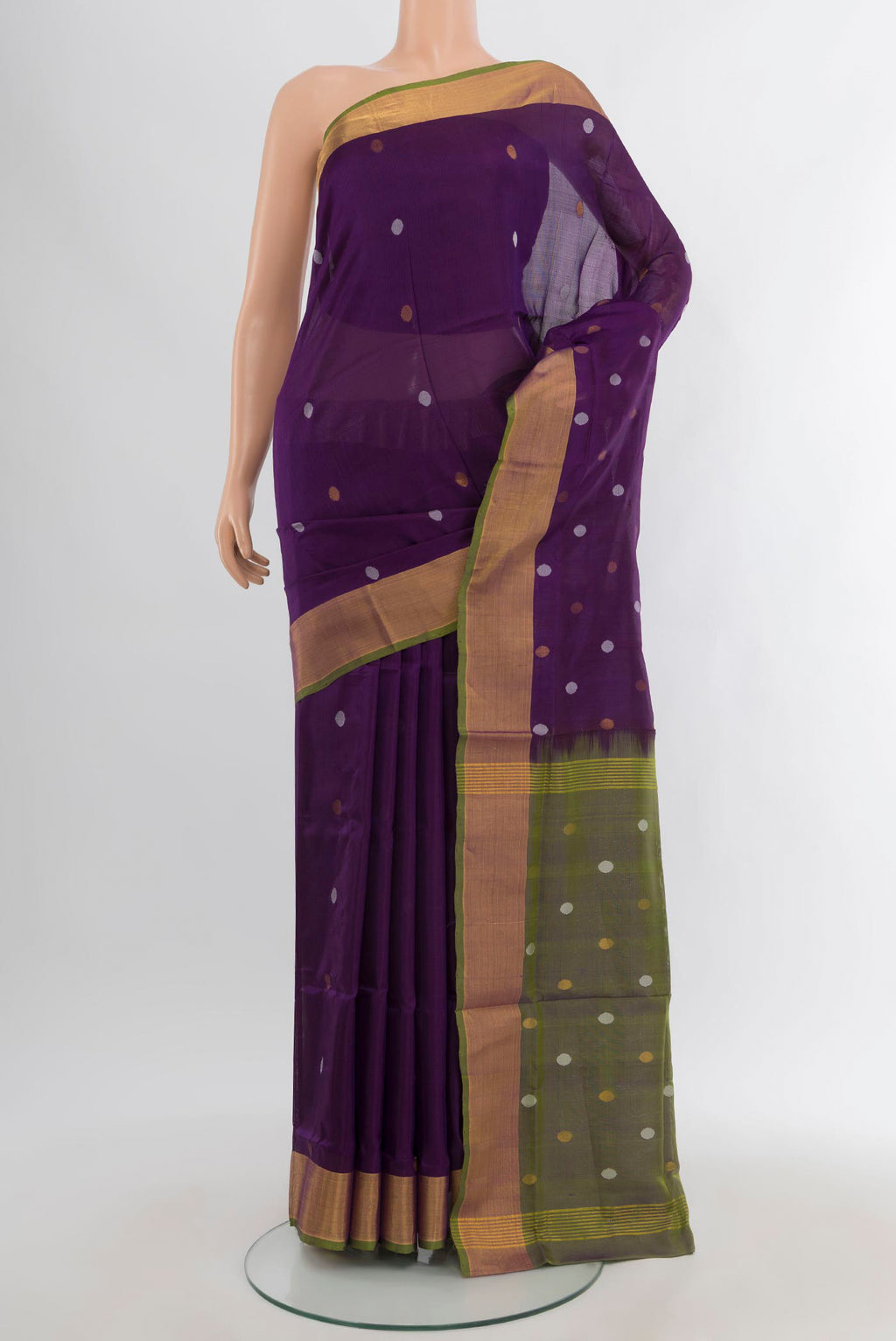 Violet Uppada Silk Saree with Zari Butta on the body and Zari Border.  displayed on a mannequin