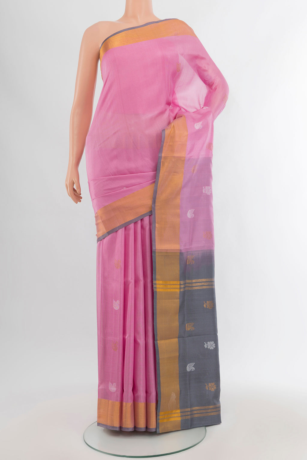 Rose pink Uppada Silk Saree with Zari Butta on the body and Zari Border.  displayed on a mannequin