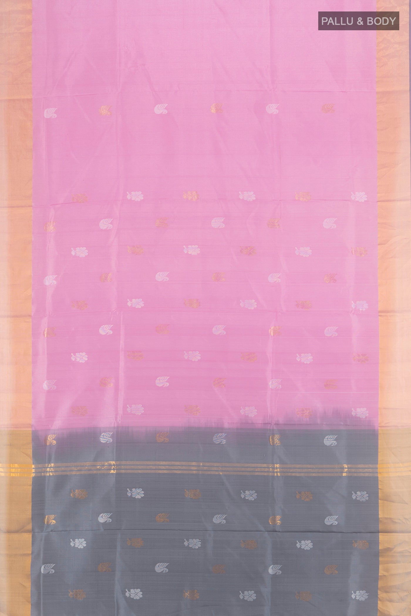 Flat view of Rose pink Uppada Silk Saree with Zari Butta on the body and Zari Border. 