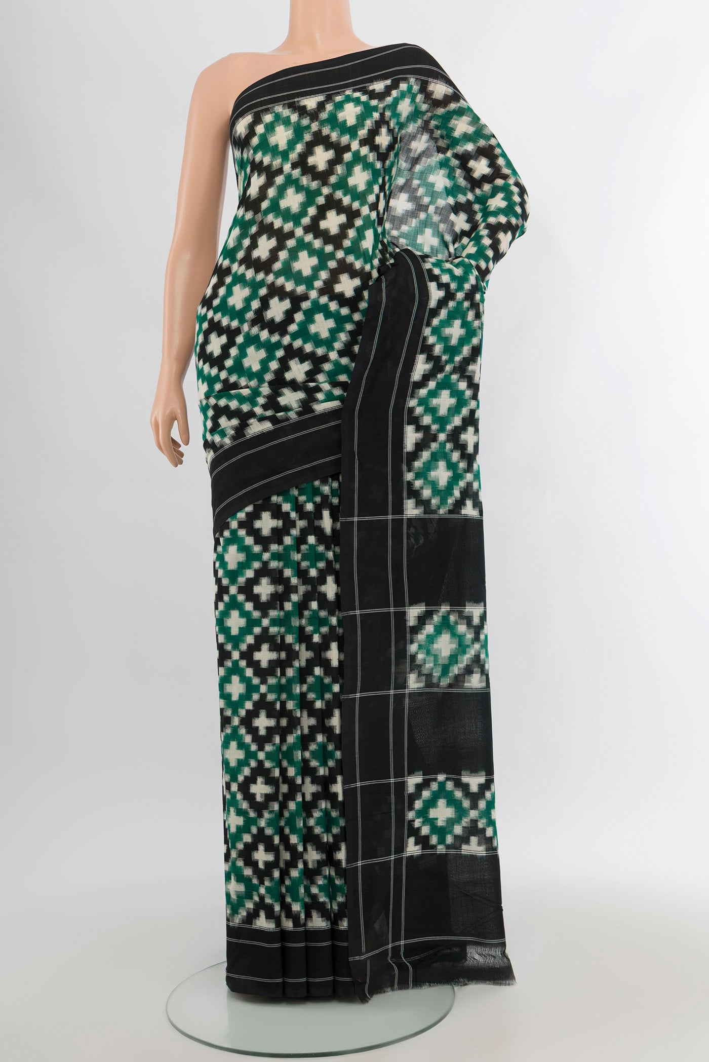 Multi Color Pochampally Cotton Saree with Ikat design on the body and Plain Border.  displayed on a mannequin