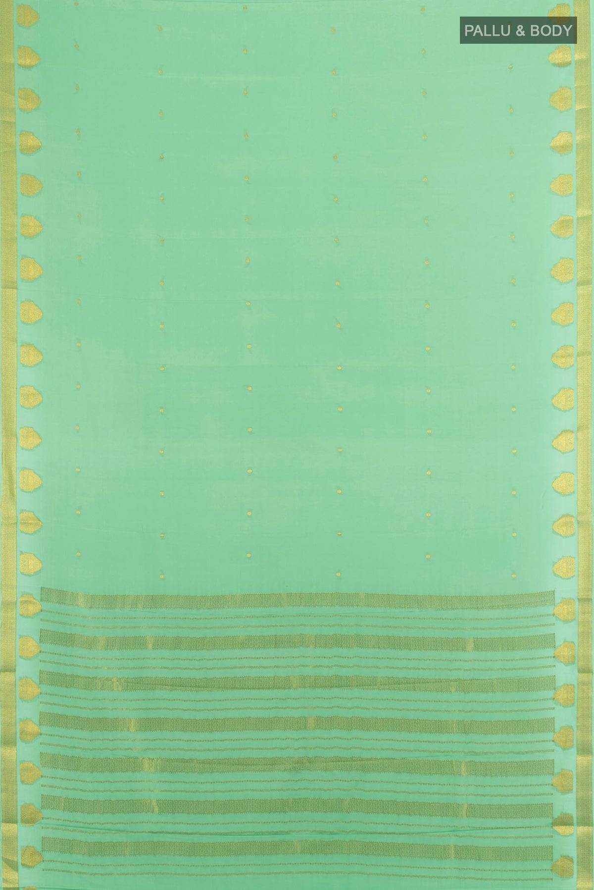 Flat view of Pista Green Mysore Crepe Saree with Zari Butta on the body and Zari Border. 
