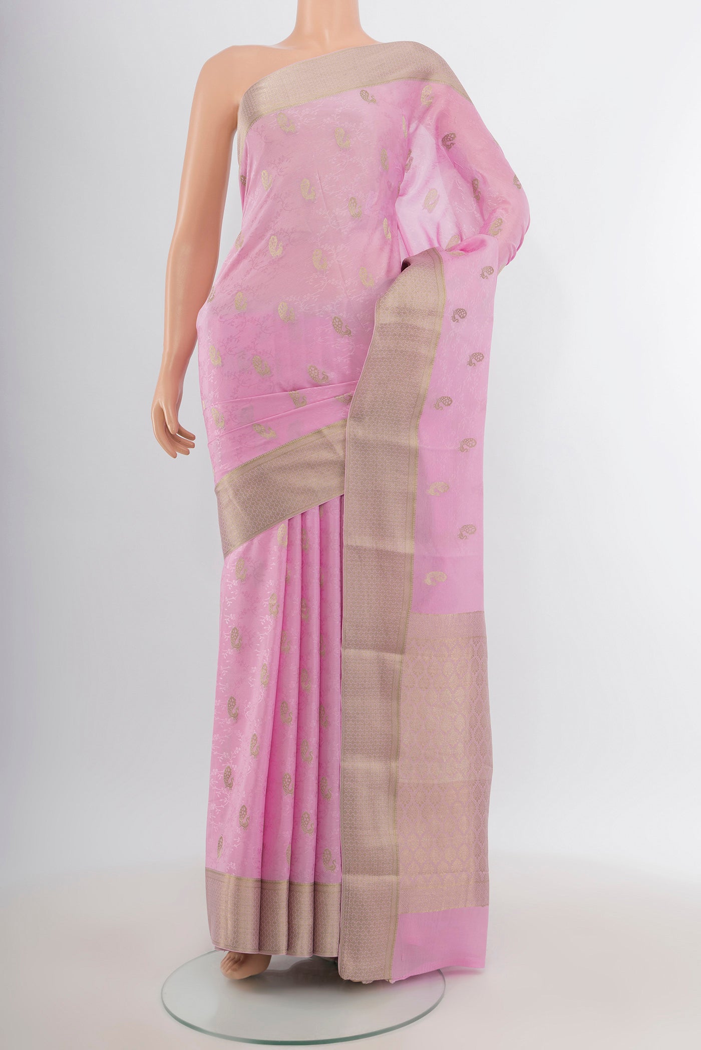 Rose pink Mysore Crepe Saree with Jacquard With Zari Butta on the body and Zari Border.  displayed on a mannequin