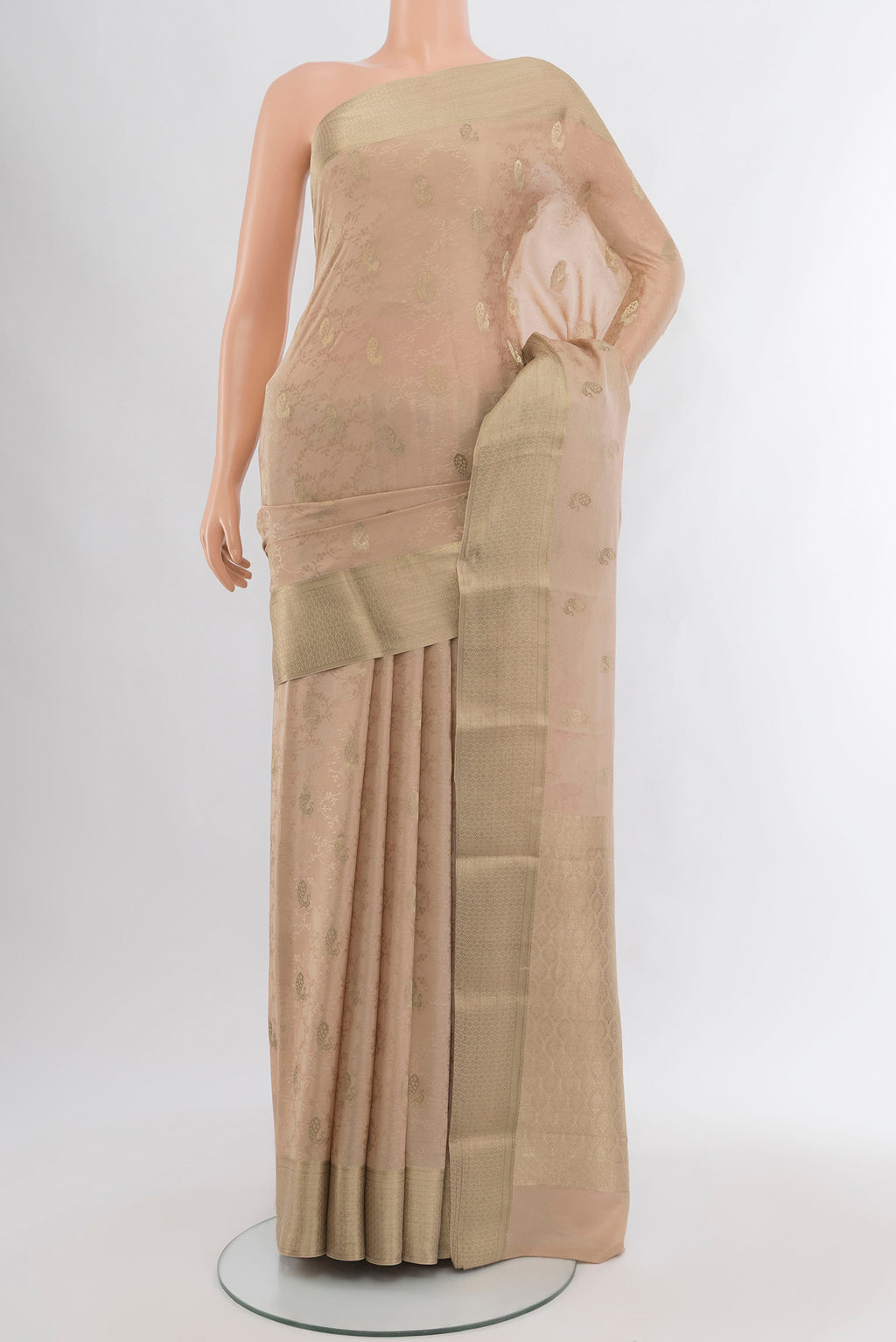 Beige Mysore Crepe Saree with Jacquard With Zari Butta on the body and Zari Border.  displayed on a mannequin