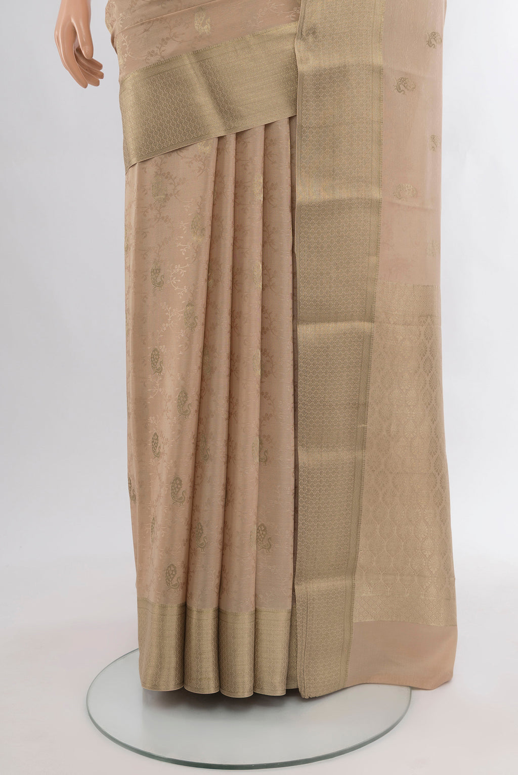 Pleats and pallu of Beige Mysore Crepe Saree with Jacquard With Zari Butta on the body and Zari Border. 