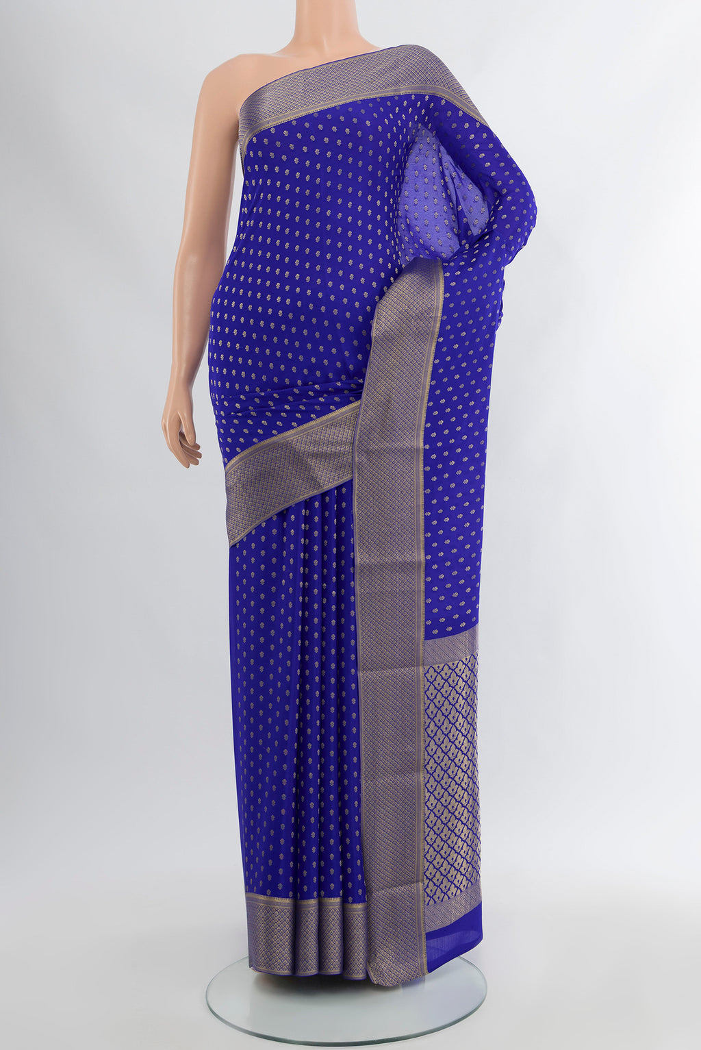 Dark Blue Mysore Crepe Saree with Zari Butta on the body and Silk Border.  displayed on a mannequin
