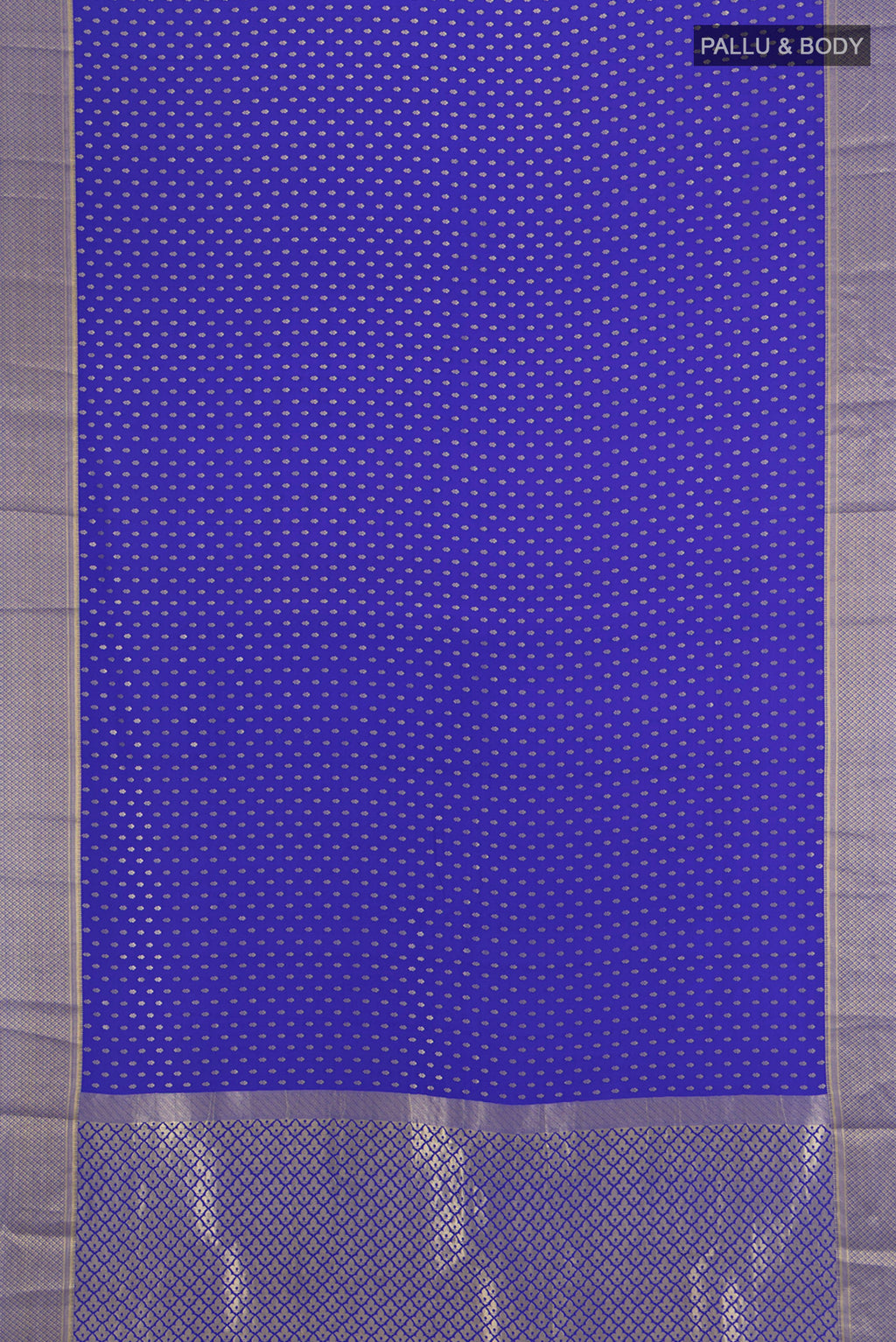 Flat view of Dark Blue Mysore Crepe Saree with Zari Butta on the body and Silk Border. 