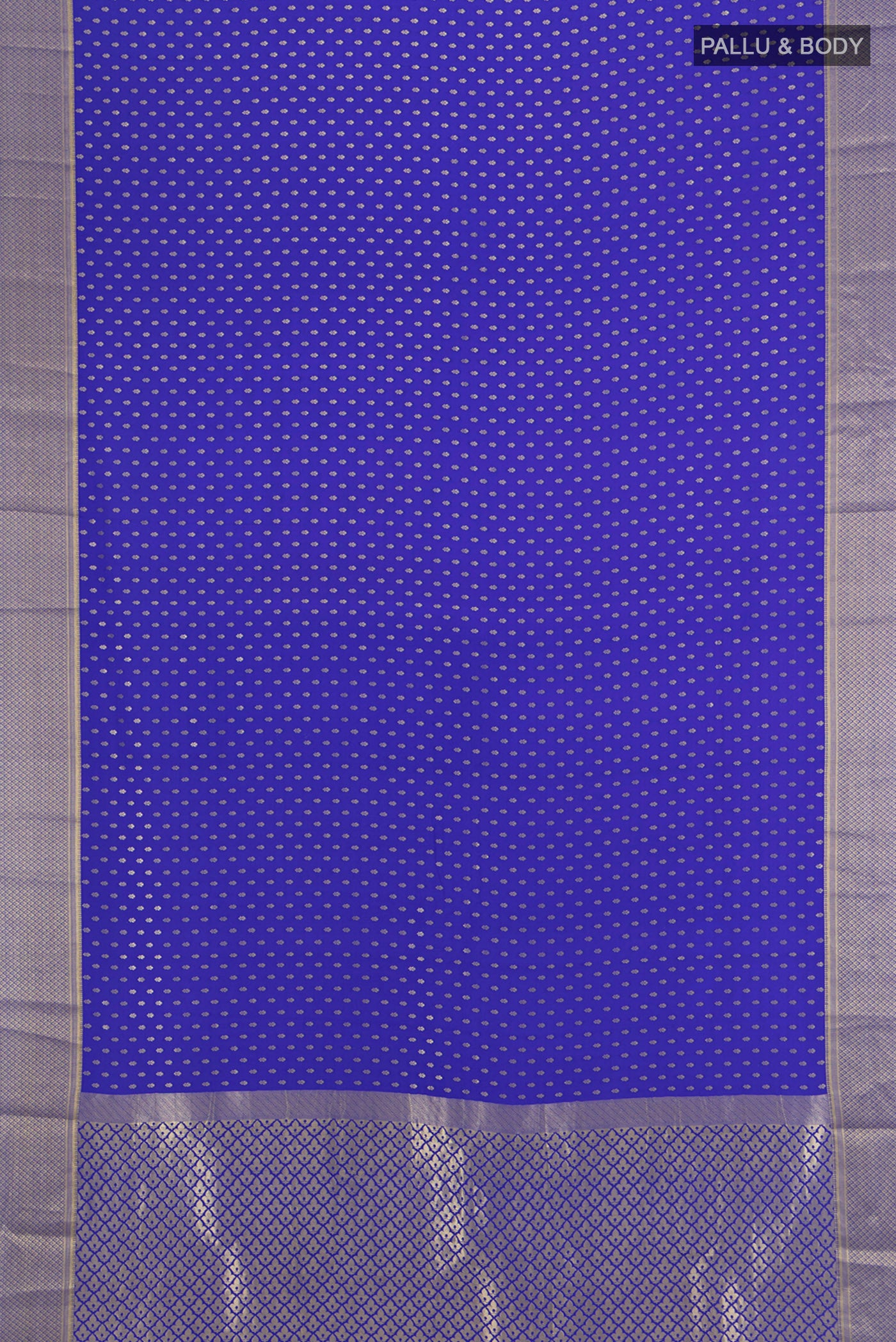 Flat view of Dark Blue Mysore Crepe Saree with Zari Butta on the body and Silk Border. 