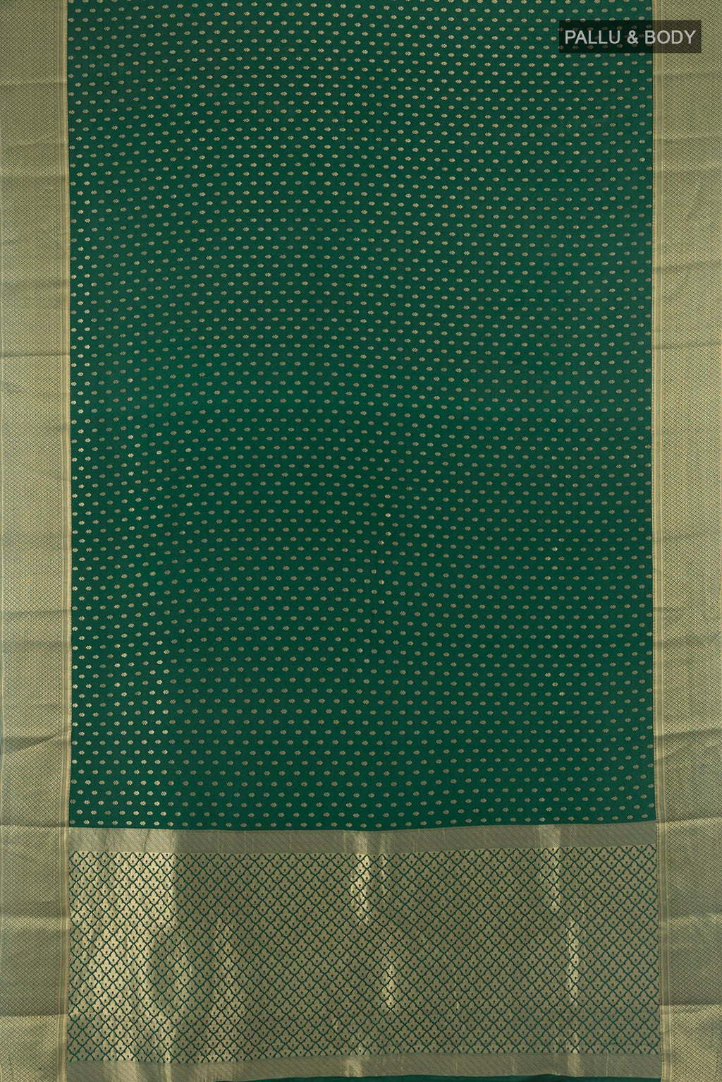 Flat view of Green Mysore Crepe Saree with Zari Butta on the body and Zari Border. 