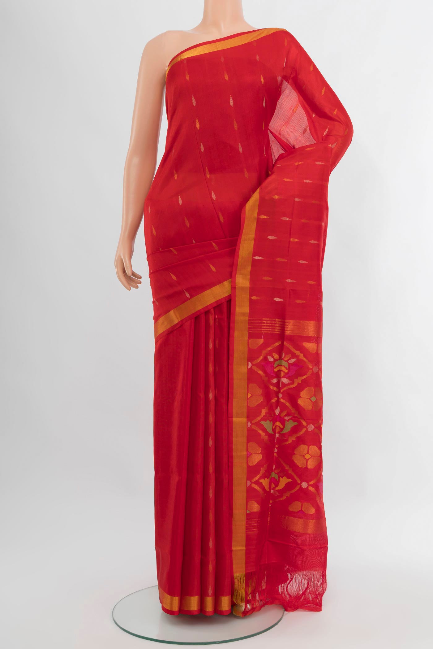 Red Uppada Silk Saree with Zari Butta on the body and Fancy Border.  displayed on a mannequin