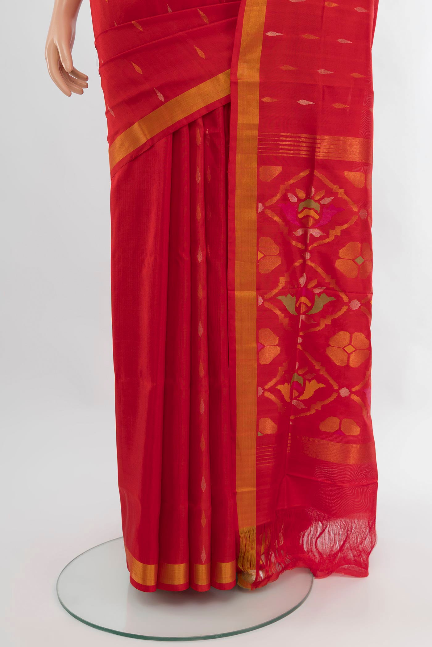 Pleats and pallu of Red Uppada Silk Saree with Zari Butta on the body and Fancy Border. 