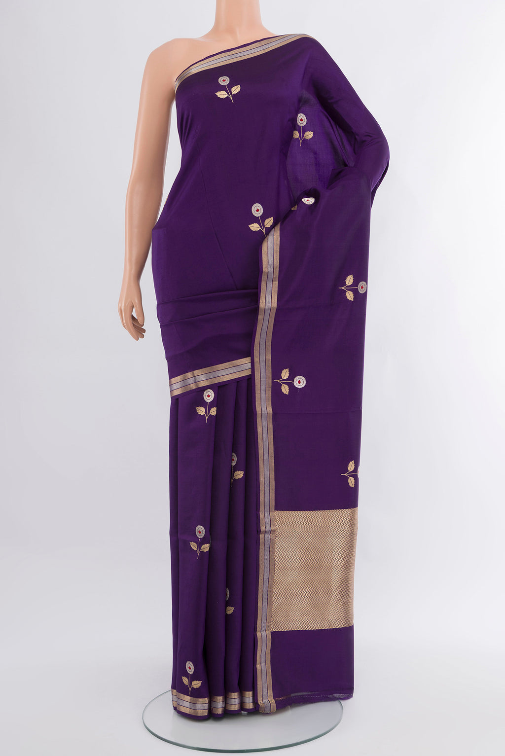 Violet Banarasi Katan Silk Saree with Zari Butta on the body and Zari Border.  displayed on a mannequin