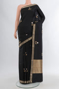 Black Banarasi Katan Silk Saree with Zari Butta on the body and Zari Border.  displayed on a mannequin