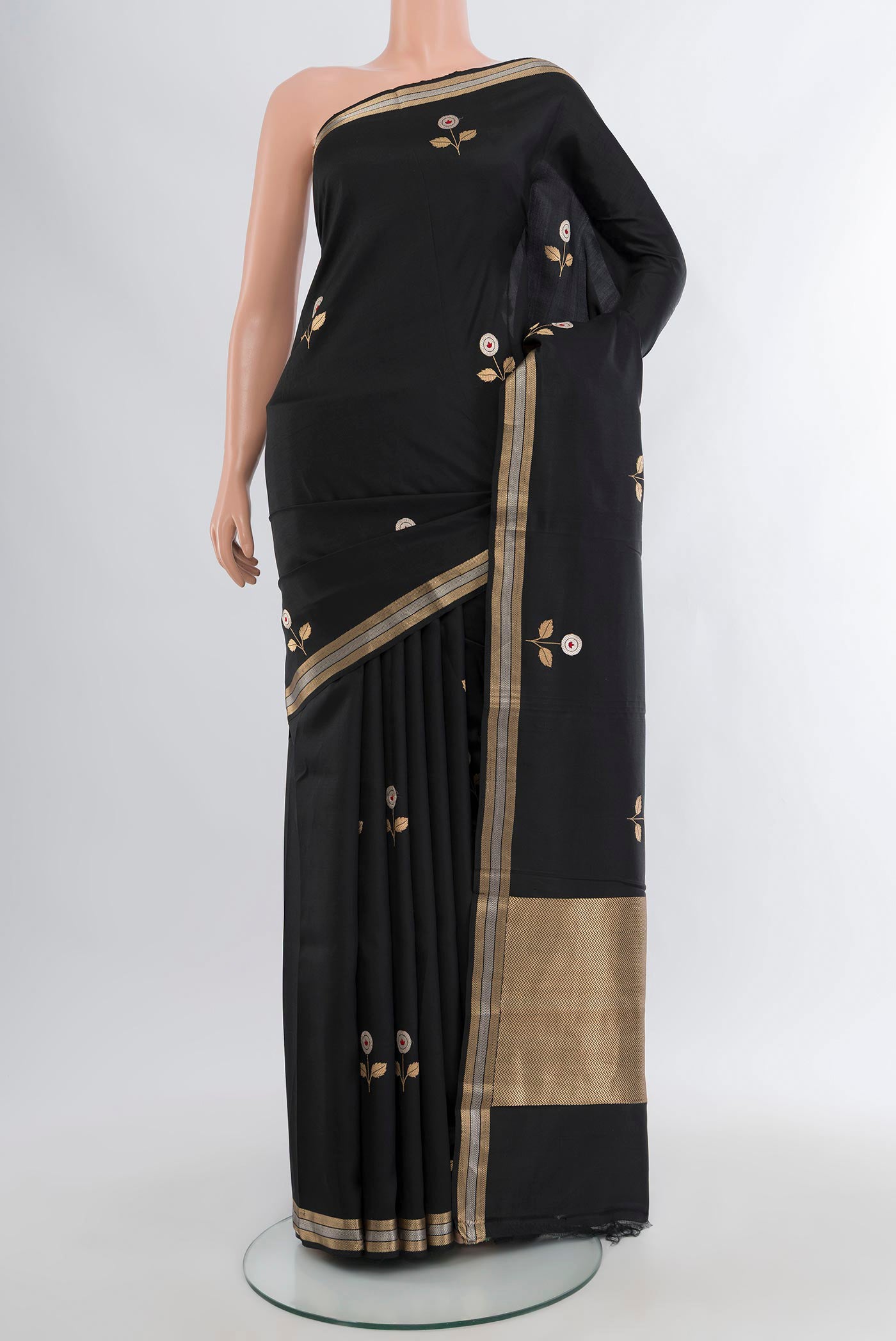 Black Banarasi Katan Silk Saree with Zari Butta on the body and Zari Border.  displayed on a mannequin