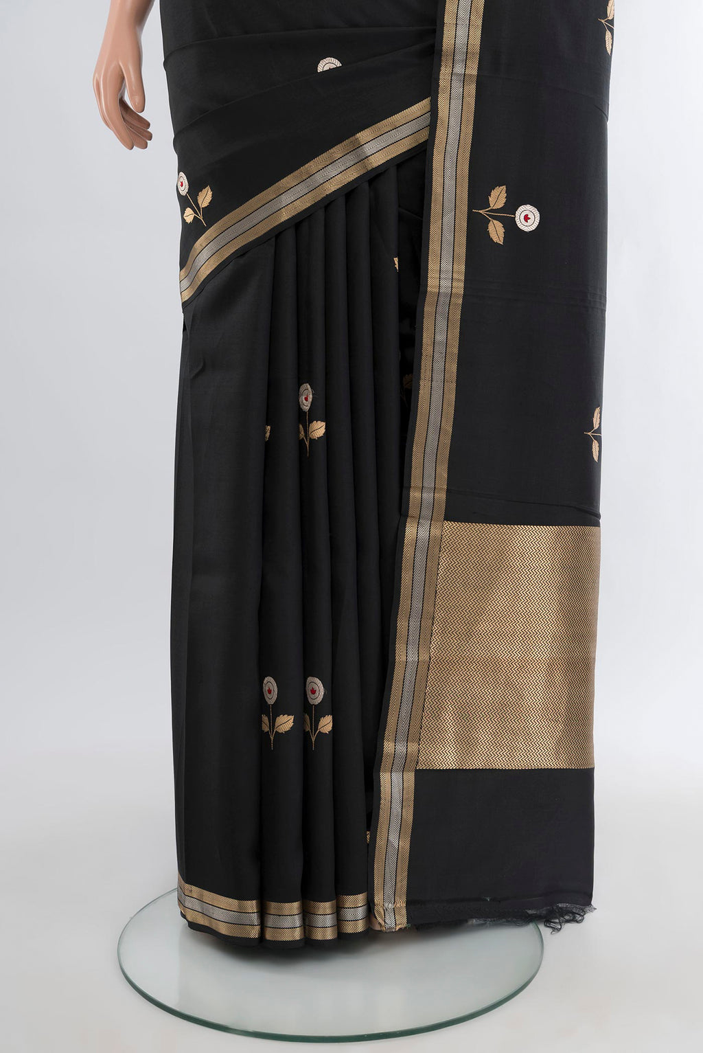 Pleats and pallu of Black Banarasi Katan Silk Saree with Zari Butta on the body and Zari Border. 
