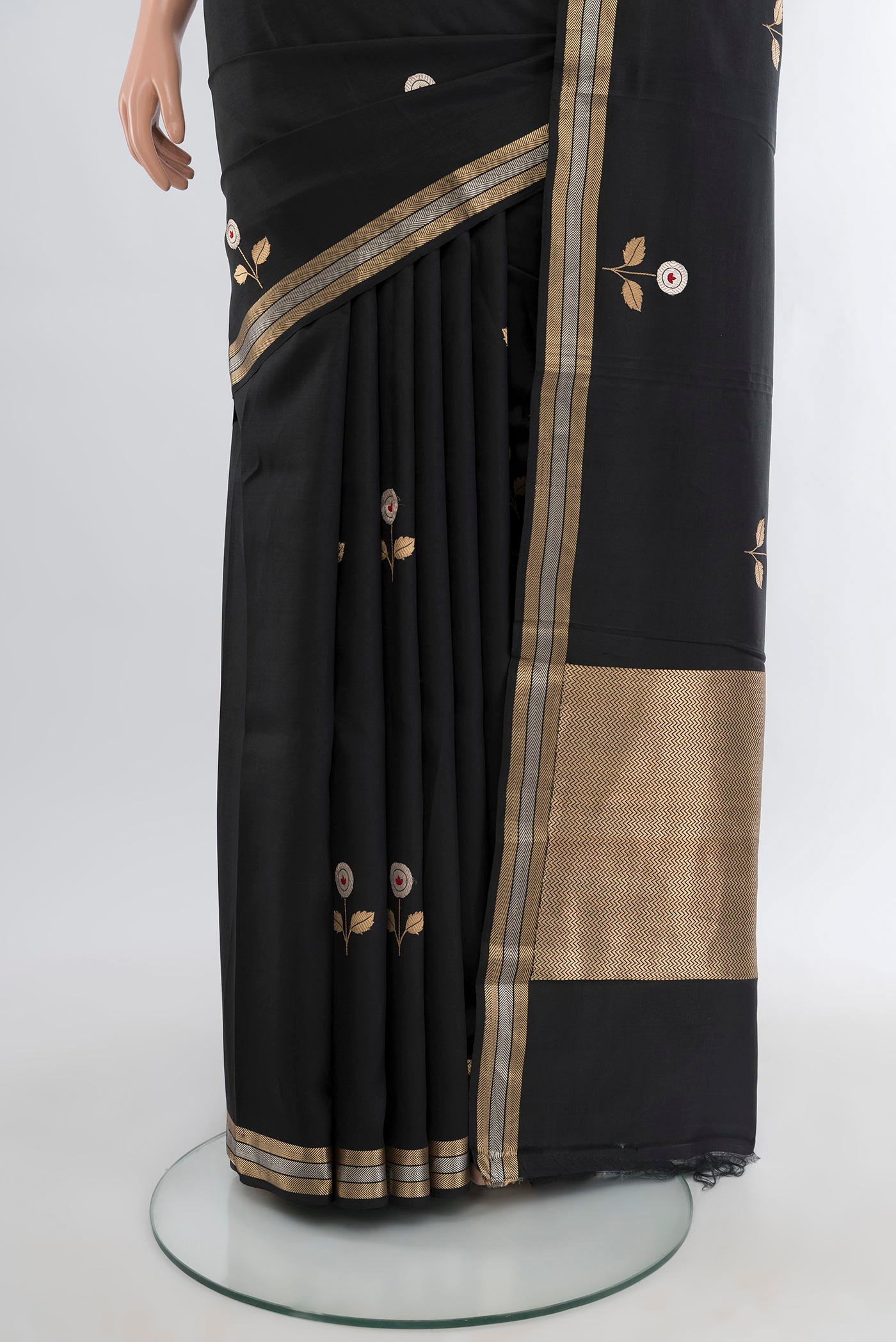 Pleats and pallu of Black Banarasi Katan Silk Saree with Zari Butta on the body and Zari Border. 