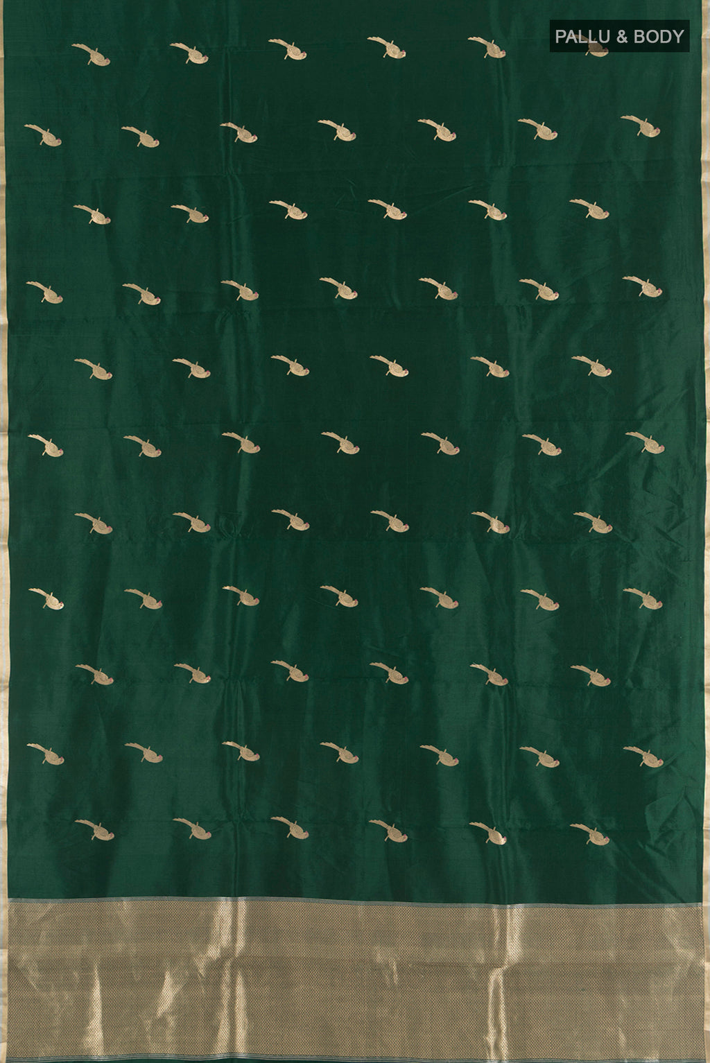 Flat view of Bottle Green Banarasi Katan Silk Saree with Zari Butta on the body and Zari Border. 