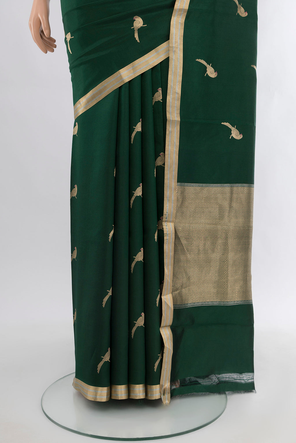 Pleats and pallu of Bottle Green Banarasi Katan Silk Saree with Zari Butta on the body and Zari Border. 