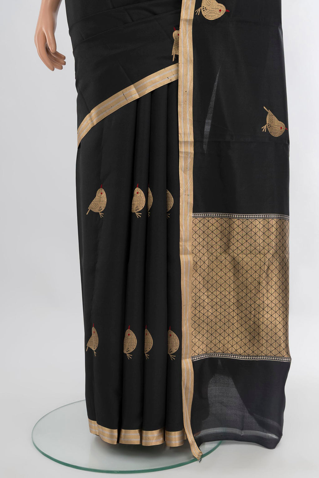 Pleats and pallu of Black Banarasi Katan Silk Saree with Zari Butta on the body and Zari Border. 