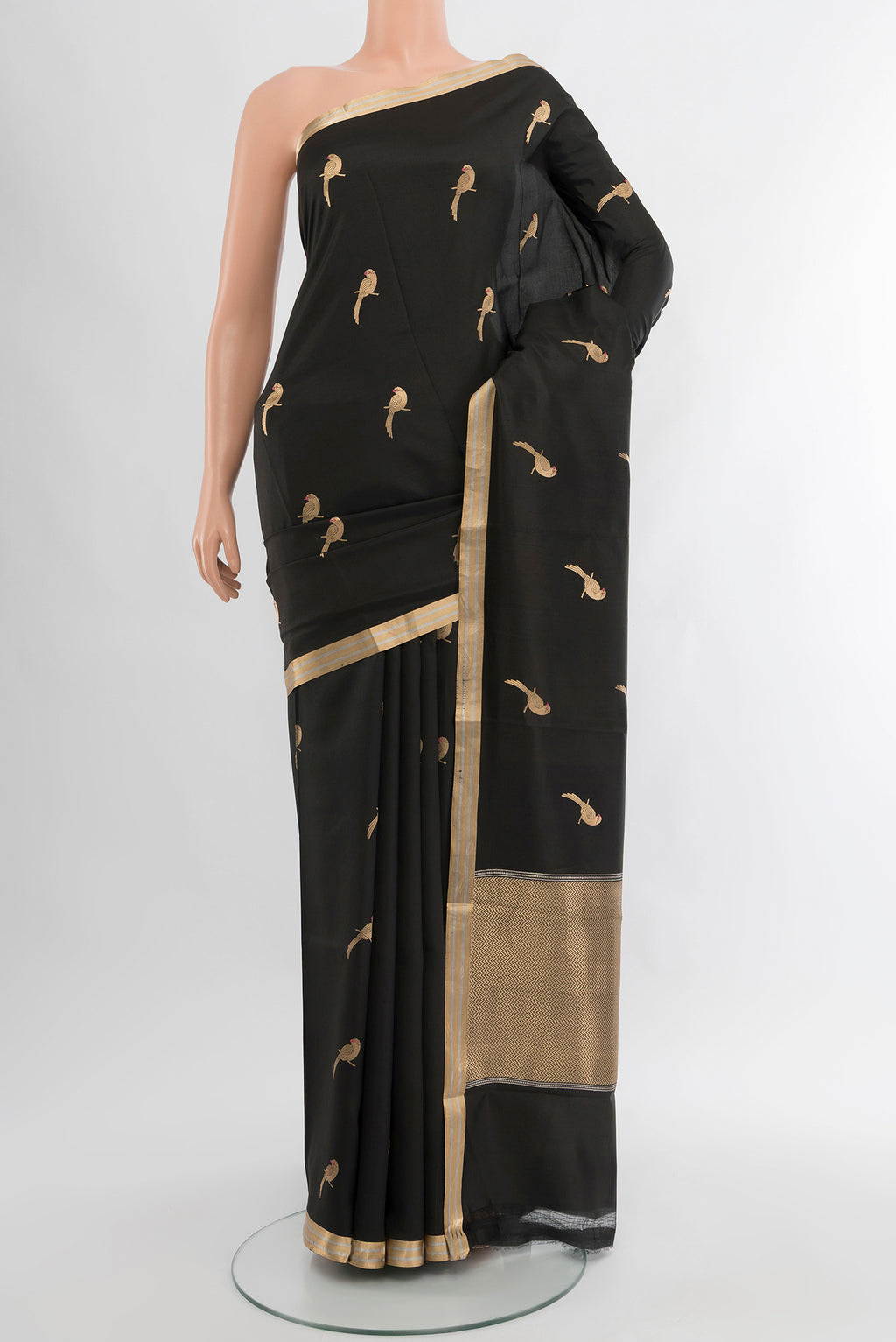 Black Banarasi Katan Silk Saree with Zari Butta on the body and Silk Border.  displayed on a mannequin