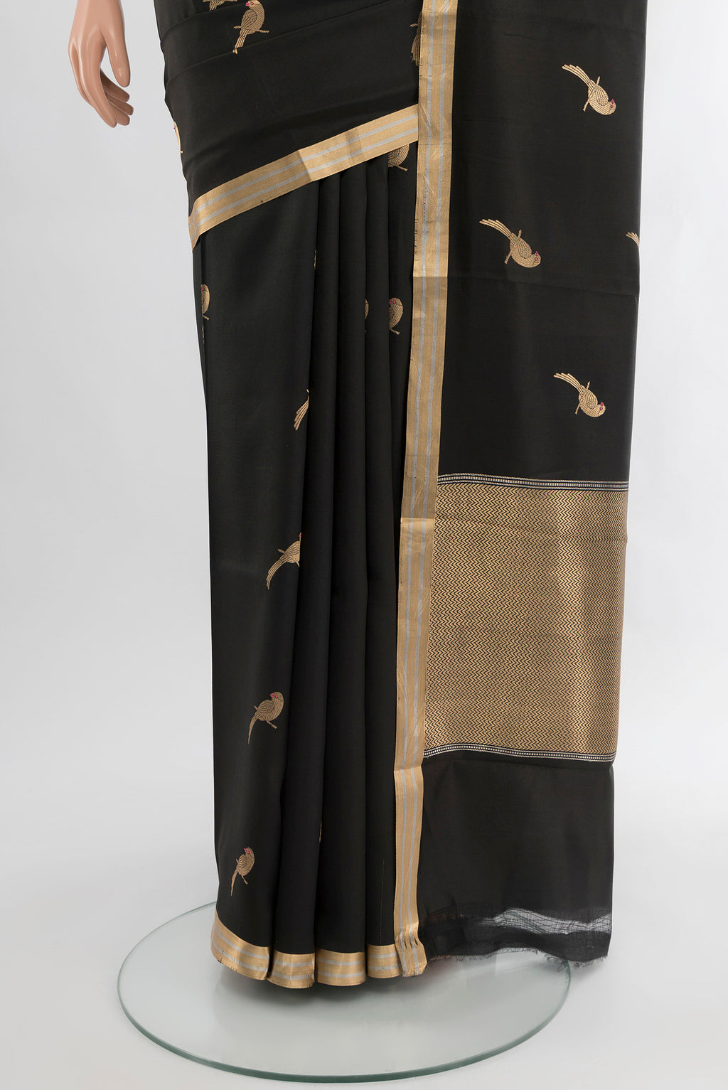 Pleats and pallu of Black Banarasi Katan Silk Saree with Zari Butta on the body and Silk Border. 