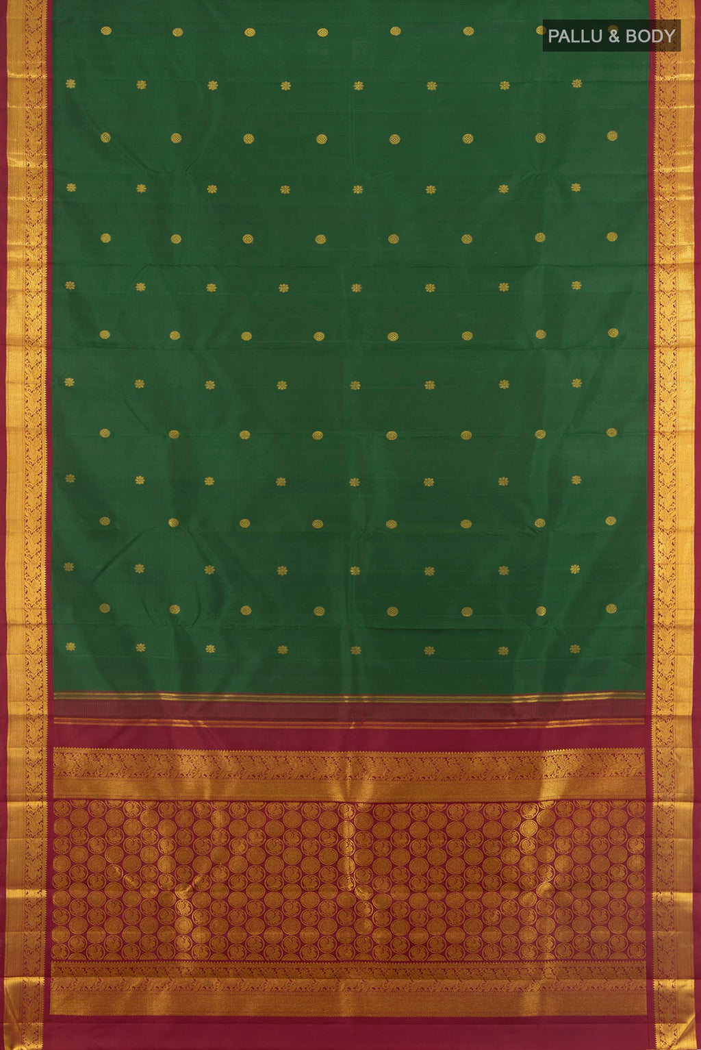 Flat view of Bottle Green Kanchipuram Silk Saree with Zari Butta on the body and Zari Border. 