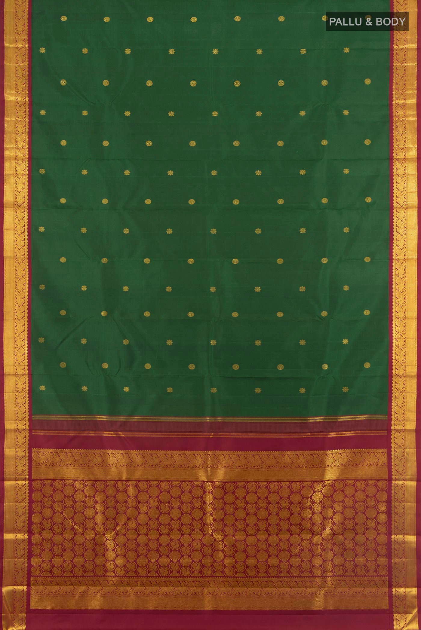 Flat view of Bottle Green Kanchipuram Silk Saree with Zari Butta on the body and Zari Border. 